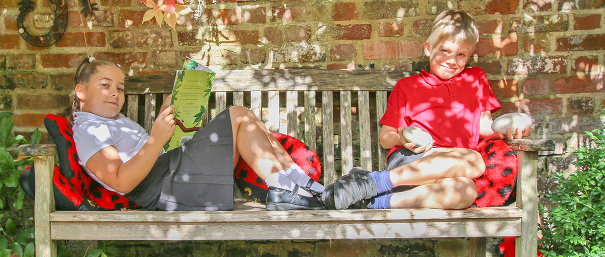 Pupils on a bench at Chilham School